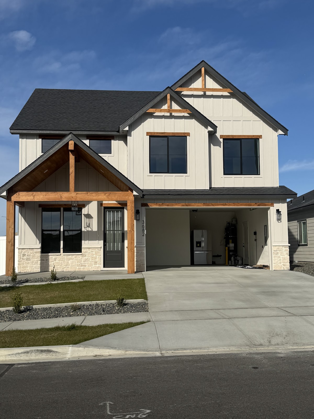 Freshly repainted home exterior with clean siding